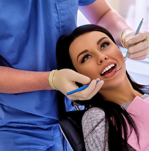 dentist examining teeth dentistry
